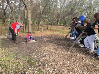 students outside at a nature center