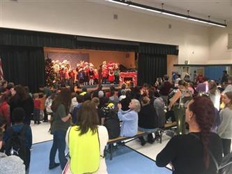 student holiday performance in the cafeteria