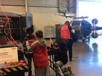 students doing an activity in a space museum