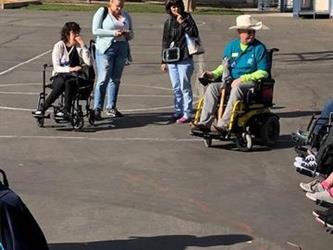 teachers outside in wheelchairs