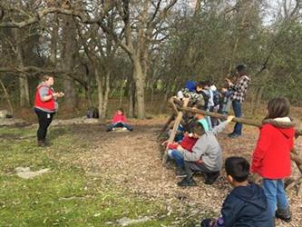 students outside at a nature center