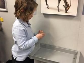 student doing a hands-on art activity 